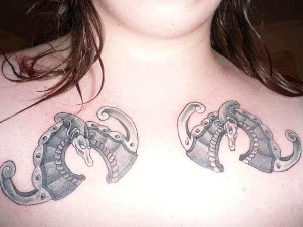 collar-bone-bats-tattoo