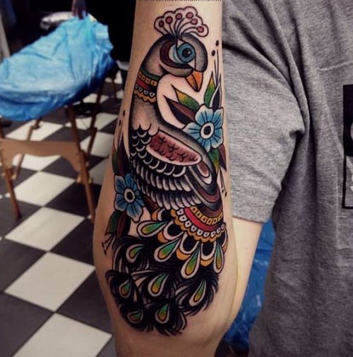 22 Stunning Peacock Tattoo Designs and Where to Ink Them  Peacock tattoo  Tattoo designs Phoenix tattoo design