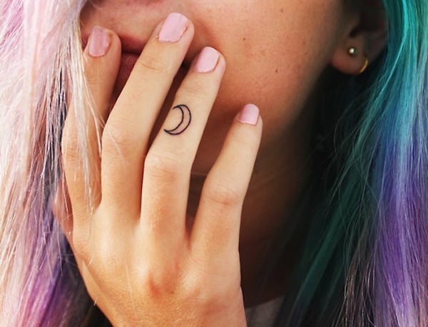 Crescent Moon Finger Tattoo