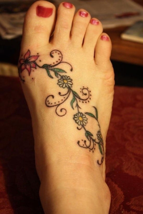 Little daisy flower tattoo done on the ankle,