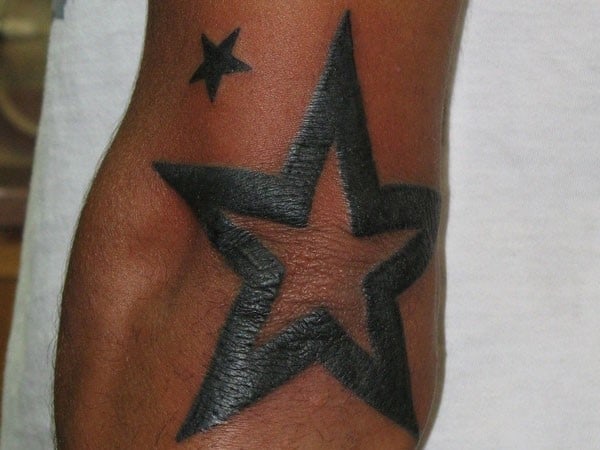 elbow star tattoos