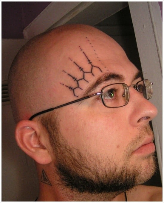 dot tattoo on face face-tattoo-designs-2