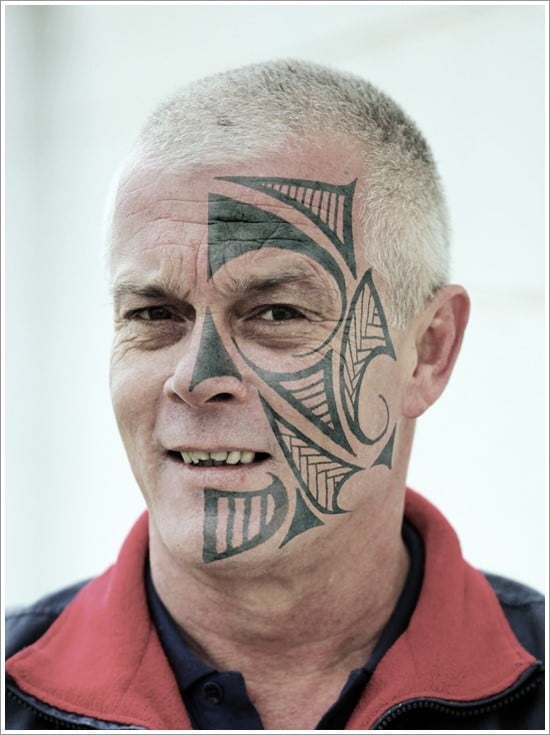 tribal tattoo on face face-tattoo-designs-7