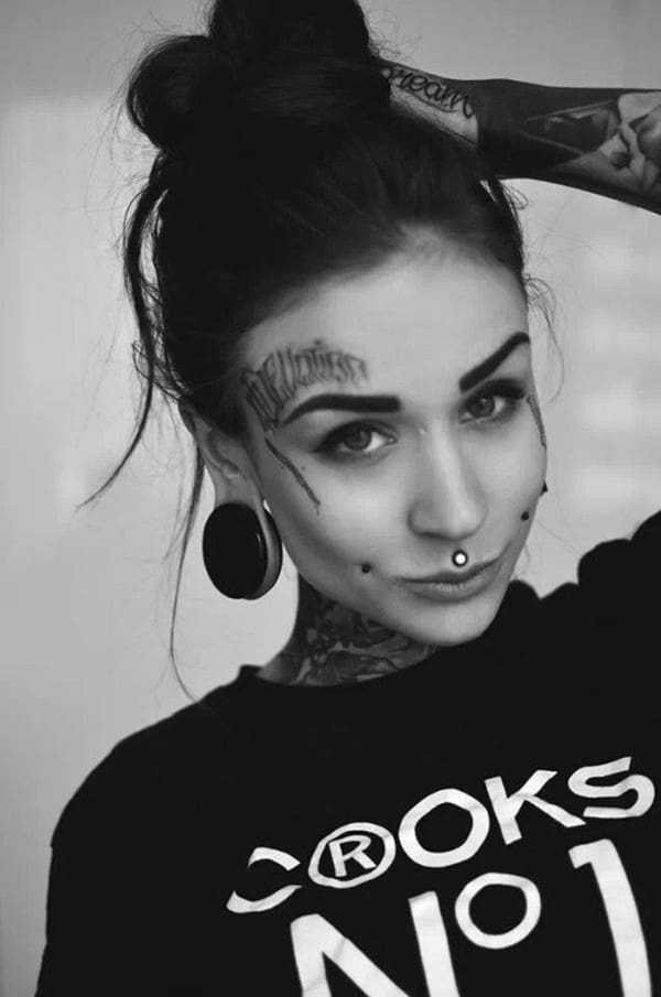 writing tattoo on face face_tattoos_38