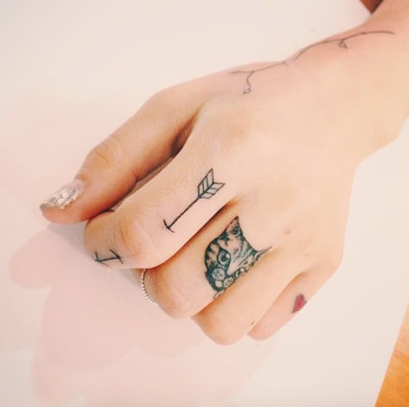 Cat and Arrow Finger Tattoos by Doy