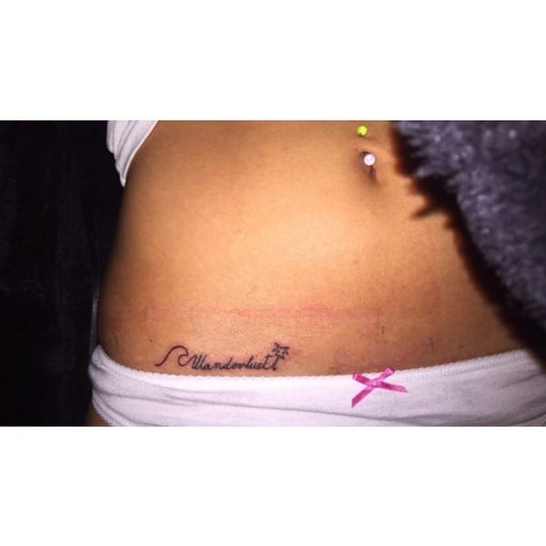 name tattoo on pelvis