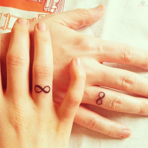 Infinity Ring Tattoos On Fingers