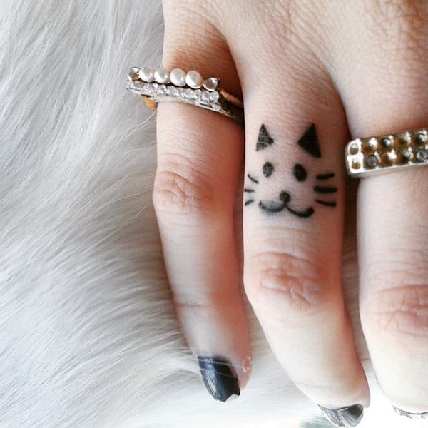 Kitty Finger Tattoo