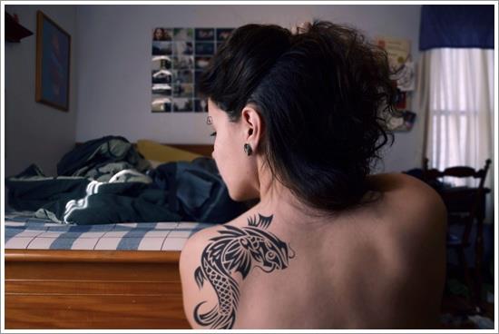 tribal koi fish tattoo on back koi-fish-tattoo-designs-6