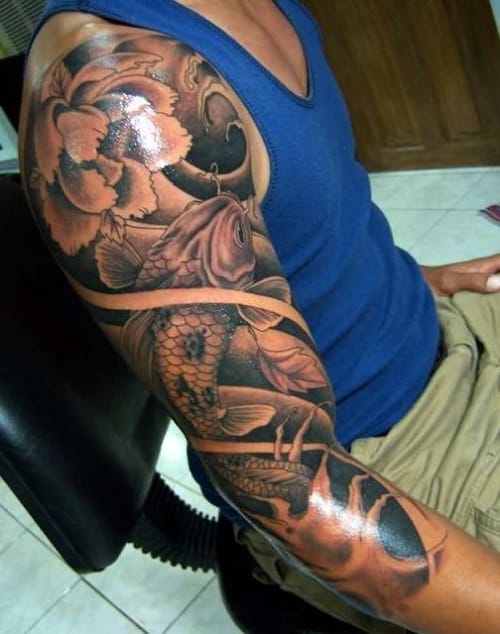 Koi Tattoo on Sleeve with Flower