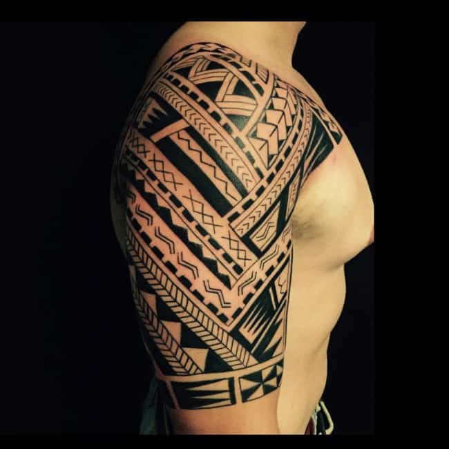 Arm with highly detailed tattoos, new school|maori style, studio : r/dalle2