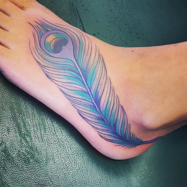 abstract watercolor feather tattoo