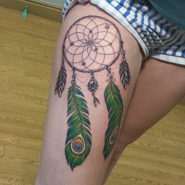 peacock feather tattoos