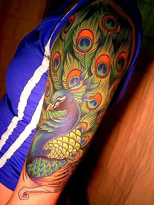Peacock Inspiration Tattoo On Upper Arm