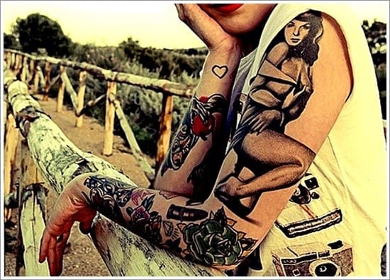 pin up girl tattoo on both arms