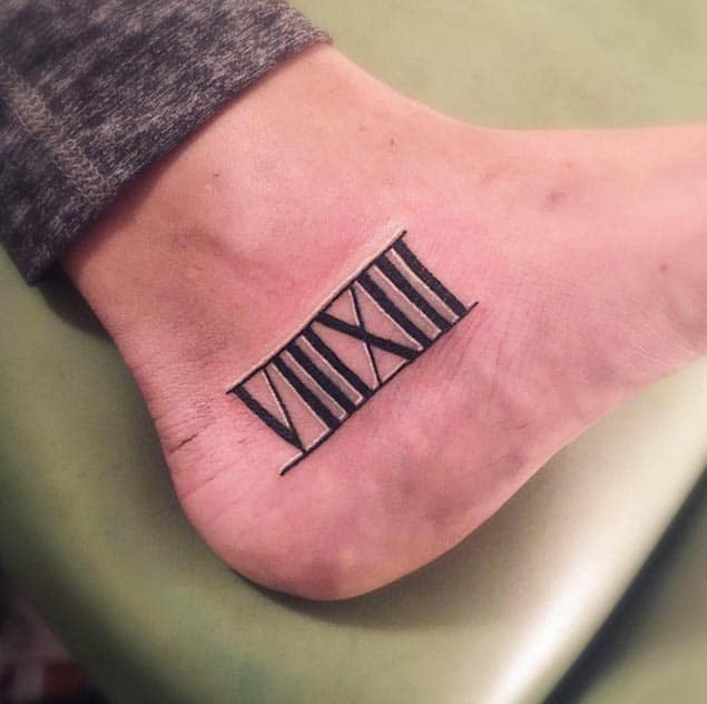Roman Numeral Foot Tattoo by Aquiles Reyes