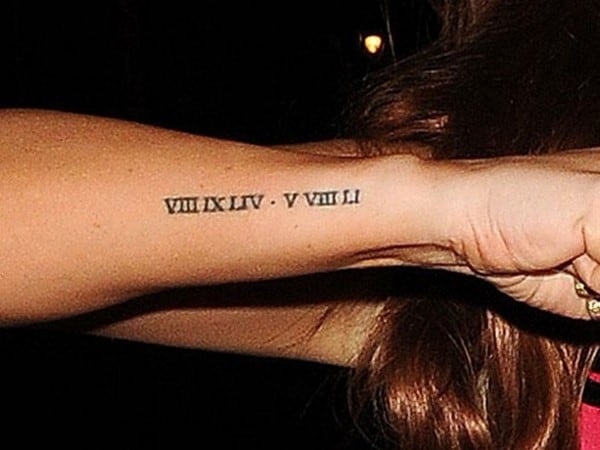 side wrist tattoo roman numeral