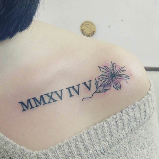 15 Awesome Roman Numeral Tattoos 2023  Moms Got the Stuff