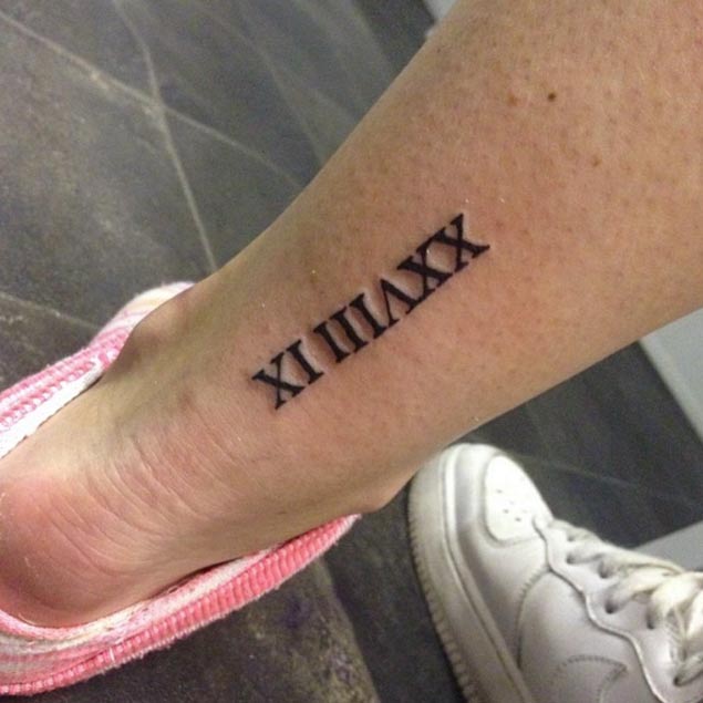 Roman Numeral Tattoo on Foot by Jade