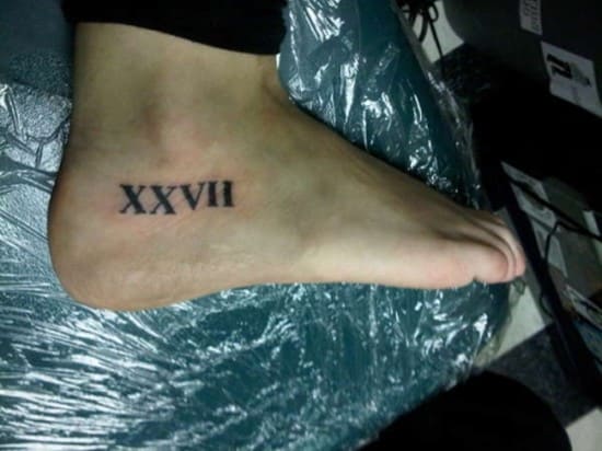 roman-numerals-tattoo-on-foot