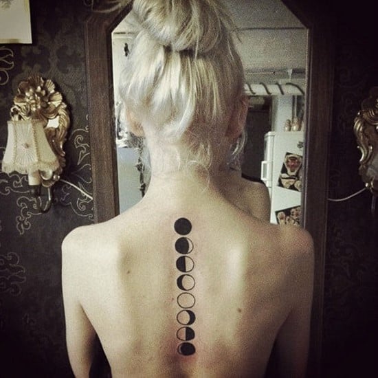 woman with spine tattoo