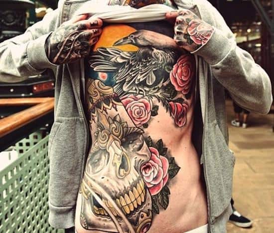 stomach-tattoo-and-chest-piece