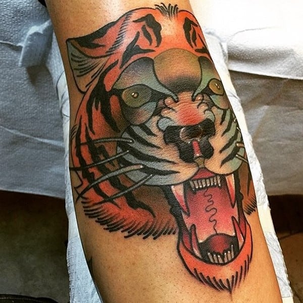 orange tiger arm tattoo