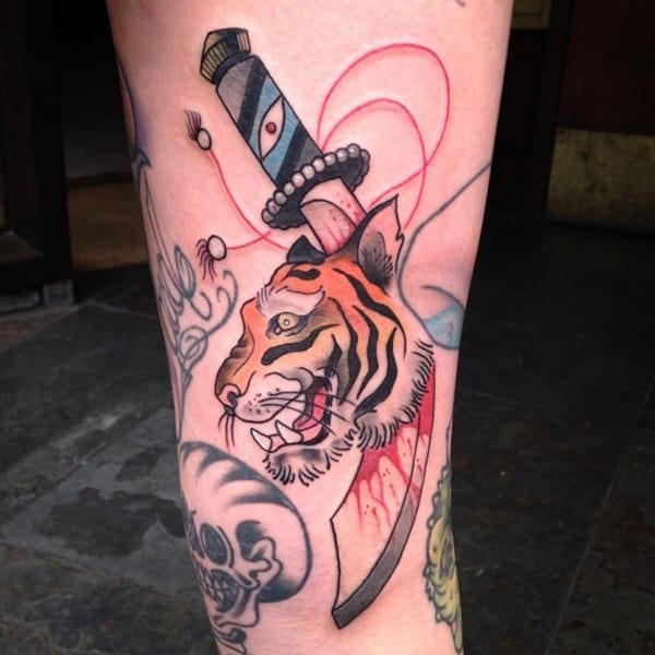 asian tiger and dagger tattoo