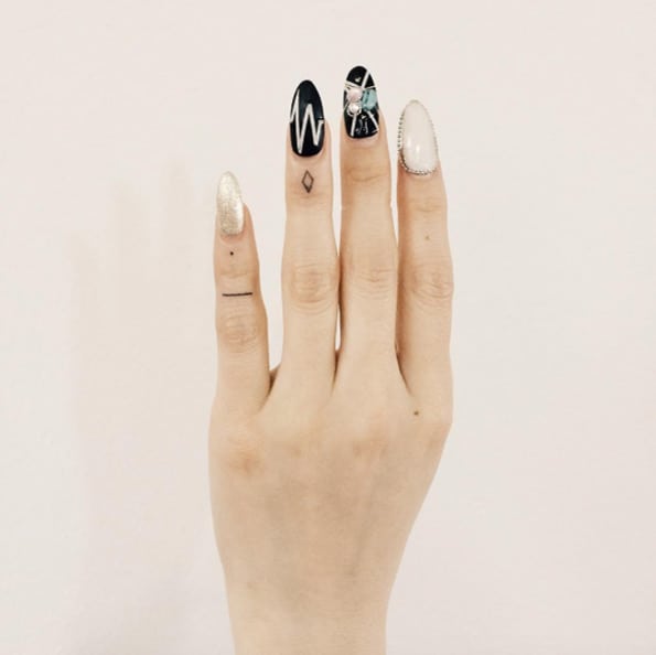 Tiny Finger Tattoos by Doy