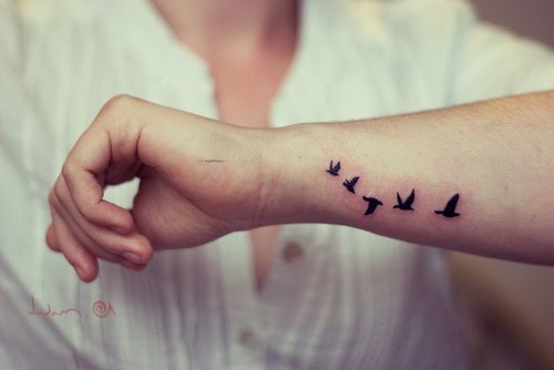 Tattoo uploaded by Benjamin  Silhouettes of 3 birds flying and If youre  a bird Im a bird In cursive script on the inside of a clients wrist in  black  Tattoodo