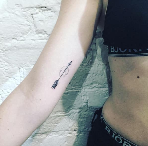 Adorable Tiny Arrow Tattoo by Anna Bravo