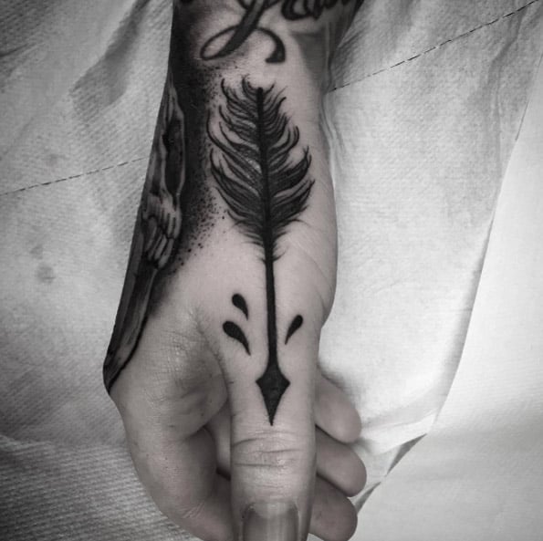 feather arrow tattoo
