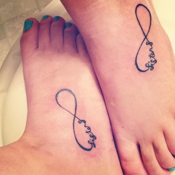 Black Infinity Sisters In Heart Tattoo On Heel