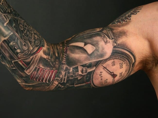 men tattoo of bionic demonic arm