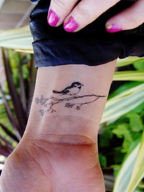 Bird Tattoo Sitting on a Branch Ideas