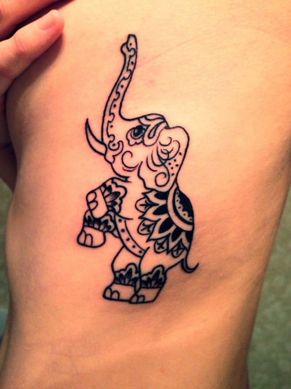 Elephant Rib Tattoo | Rib tattoo, Elephant tattoos, Girl power tattoo