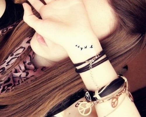 Extra Tiny Bird Tattoos on Wrist