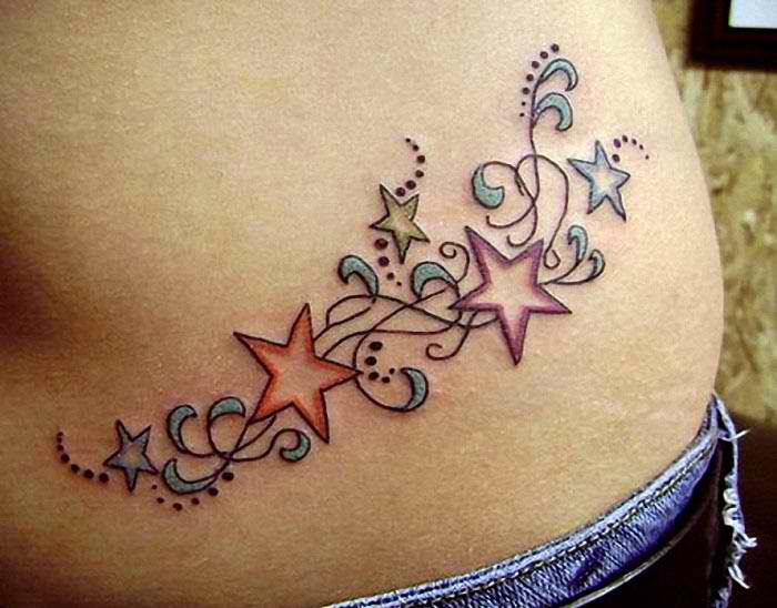 shooting star tattoo on stomach. 