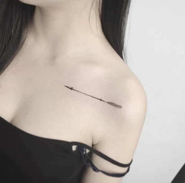 Small Arrow Tattoo on Shoulder by Flower