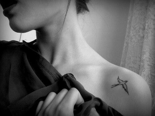 Small Flying Bird Tattoo on Shoulder