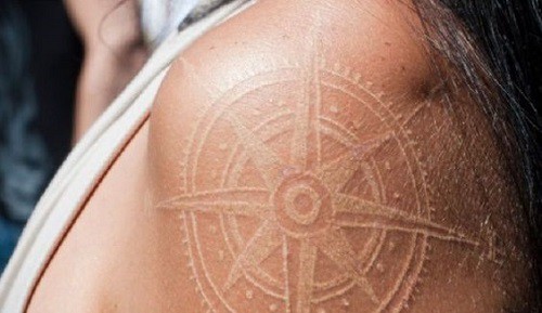 White Ink Compass Tattoo