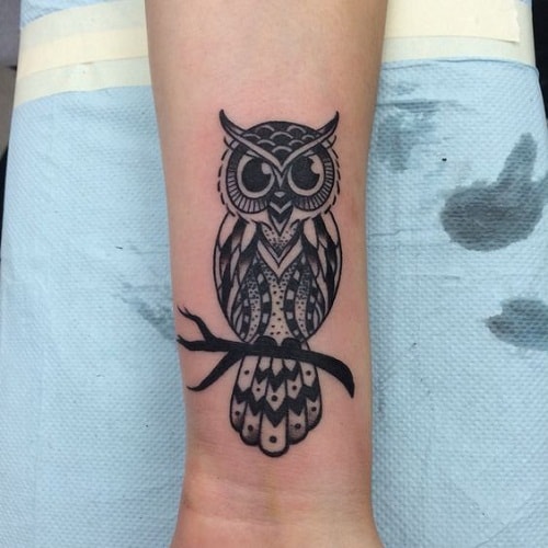 Black Owl Tattoo on Lower Arm