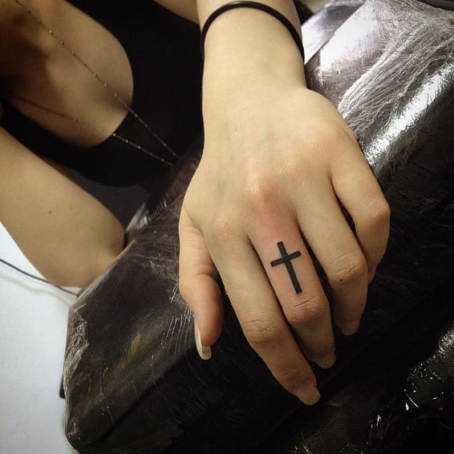 49 Elegant Cross Tattoos On Finger