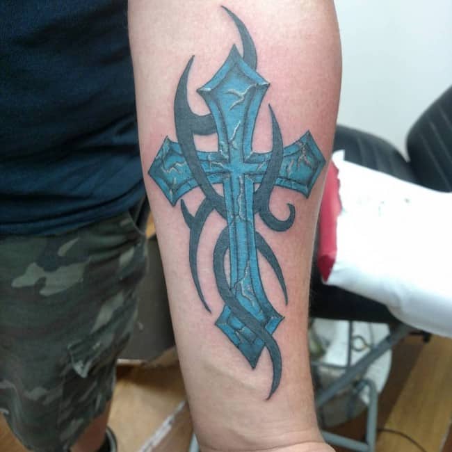 tribal cross tattoos on forearm