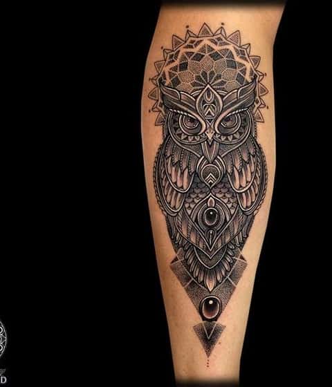 Detailed Owl Tattoo with Geometric Lines and Gems