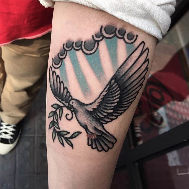 dove tattoo on thigh