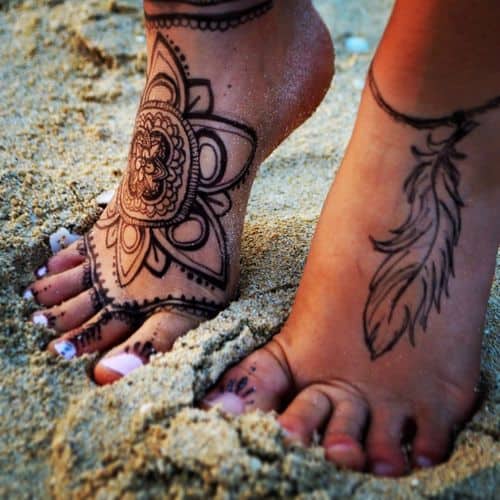 Flower Tribal Tattoos on Foot