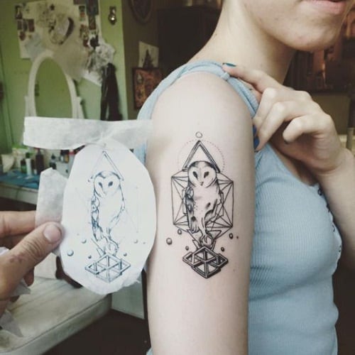 Geometric Owl Tattoos on Woman's Arm