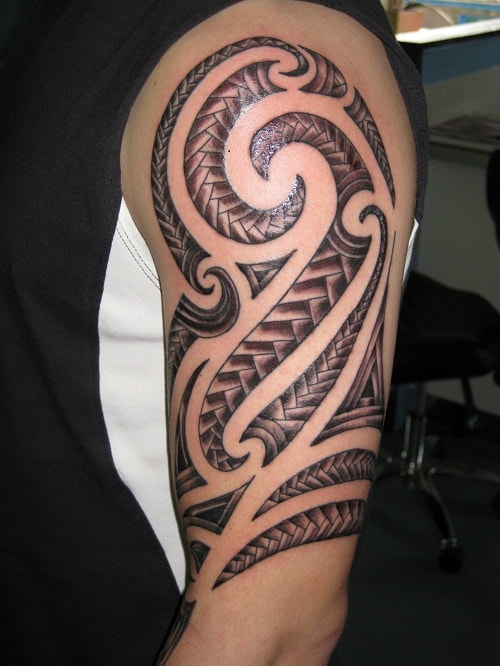 Brilliant Black Ink Half Sleeve Tribal Tattoo Design For