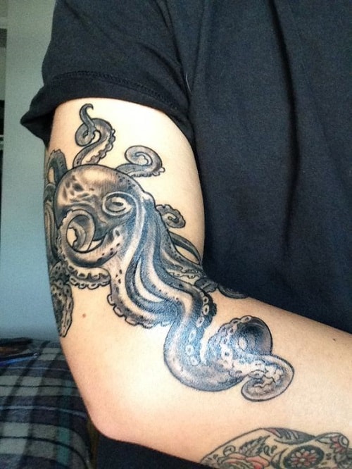 Illustrative Octopus Tattoo On Man Arm